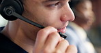 Headset, man and call center agent in office with crm, voip system or online consultation. Mic, talk and technical support consultant in workplace with customer service, help desk or contact us