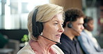 Headset, woman and call center consultant in office with crm, voip system or online advisory. Mic, talking and mature technical support agent in workplace with customer service, help desk or contact.
