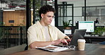 Typing, laptop and businessman in office for research on web development project at startup. Technology, reading and software engineer with computer for email feedback on UX design in workplace.