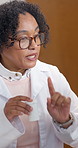 Doctor, woman and pills with video call for healthcare, prescription info or dosage with consultation. Mature, physician and virtual meeting with medicine, antibiotics or supplements with Telehealth