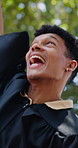 Graduation hat, throw and happy man at college, outdoor or student with pride for academic milestone. University, education and person with smile for opportunity, excited and clapping for achievement