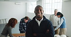 Architect, face or man in agency with arms crossed, project manager or pride as building planner. Meeting, happy or engineer lead with confidence, about us or ambition in infrastructure development.
