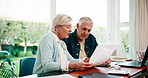 Senior, couple and finance with documents in home for income mapping, budget planning and flare. Marriage, people and discussion with invoice for financial summary, explain tax filing or pension fund