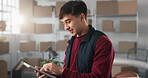 Logistics, tablet and man with boxes for distribution, laugh and ecommerce app for shipping parcel. Male person, technology and happy by shelves for storage, stockroom and search on supplier database