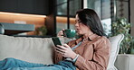 Relax, woman or hot drink with phone on sofa for social media post, texting platform or browsing. Chill, person or blow coffee with cellphone in home for online reels, site streaming or weekend break