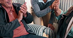 High five, caregiver and hands together with senior people for unity, applause or support in retirement home. Group, nurse and smile or stack in old age house for elderly care, celebration or goals