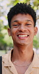 College, face or man outdoor with laugh, knowledge or positive attitude in study opportunity. Happy, bokeh or student with joke reaction, university scholarship or confidence in academic development.
