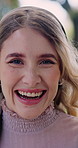 Face, happy and girl or student outdoor on campus with laughing, academic scholarship and education. Female learner, portrait and humor in park for knowledge, college opportunity and development