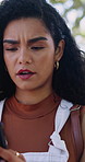 Upset, phone and woman outdoor with email for negative feedback on university application. Annoyed, technology and student texting on mobile app for rejection on college scholarship with cellphone.