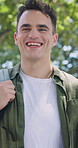 College, face or man in park with laugh, knowledge or positive attitude in study opportunity. Happy, bokeh or student outdoor with humor, university scholarship or confidence in academic development.