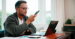 Remote work, phone call and man with laptop in home for financial advice, asset analysis or update. Tech, freelancer and happy person talking to contact for investment charts, tax savings and flare