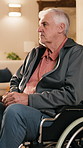 Retirement, thinking and old man in wheelchair, lounge and patient in nursing home or contemplating. Memory, reflection and senior person with disability, thoughts and remembering choice on break