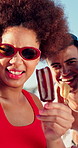 Holiday, selfie and friends at ocean with ice cream, connection and fun time on summer break. Happy, laugh and people at beach with popsicle, bonding post or memory capture in getaway photo.