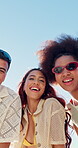 Face, fashion and laughing with group of friends outdoor for holiday, travel or vacation in summer. Beachwear, break and funny with people in fresh air for bonding, weekend getaway or youth culture