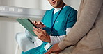 Doctor, talking and hands with tablet in hospital, healthcare or explaining test results to patient. Clinic, medical professional and discussion with mature person, happy and diagnosis on website