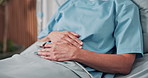 Hands, sick and person in hospital bed with oximeter for healthcare, healing and rest for recovery. Woman, illness and medical care with patient, pulse and measure blood oxygen levels for wellness