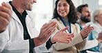 Clapping, meeting and director with doctors in hospital for presentation, announcement or training. Discussion, collaboration and team of healthcare employees with applause for medical service.