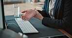 Laptop, hands and business person with wrist pain in office for muscle tension, pressure or overworked. Deadline, female analyst and finance report with inflammation, carpal tunnel or joint ache