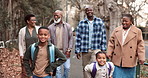 Family, happiness and face with generations by new house, flare and care with bonding on front lawn. Black people, grandparents and parents with children outdoor for moving, relocation or together