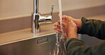 Child, water and washing hands by kitchen sink in home for hygiene, wellness and bacteria prevention. Kid, fresh and tap in house for skincare, health and disinfection for cleaning or rinsing