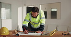 Man, engineer and drawing on document for construction, blueprint and sketch for architecture. Person, writing and tablet at site with paperwork, floor plan and property layout for building expansion