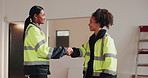 Architect, women and handshake on site with tablet, design agreement or collaboration for renovation. Happy, people and shaking hands in commercial building with tech, architecture team or discussion