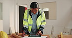 Woman, engineer and writing with tablet for construction, blueprint and research for architecture. Contractor, reading and tech at site with documents, floor plan and checklist for building expansion