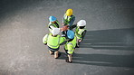 Group, huddle and architect with hands together in warehouse above for construction success. Top view, people or team of contractors piling with applause for winning, celebration or unity in depot