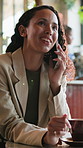 Phone call, freelancer and woman in cafe with smile, ad feedback or sponsorship negotiation. Communication, remote work and happy person talk to contact for social media marketing in coffee shop