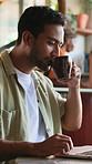 Man, laptop or drink coffee in cafe with remote work, search trend or proposal for online marketing. Creative, freelancer and person in diner with computer, beverage and plan for digital ad campaign.
