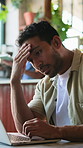 Remote work, headache and man with laptop in cafe, reflection or unhappy with design mistake on web. Freelance, graphic designer and person with tech, migraine and reading negative feedback in shop