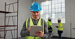 Engineer, man and tablet at construction site for development progress, design review or log report. Tech, happy person and architecture inspection, building information and maintenance schedule