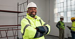 Arms crossed, face and laughing with construction worker on site for building or civil engineering. Architecture, funny and leadership with mature developer in work uniform for project management