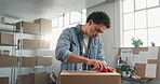 Man, package and unboxing with boxcutter at logistics startup office, parcel or supplier. Happy person, box and knife for opening, shipment and small business with export process for distribution