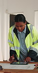 Blueprint, woman and construction worker with tablet on site for planning renovation of building. Digital technology, drawing and civil engineer with design for maintenance or property development.