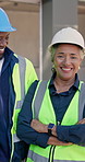 Team, laugh and engineer at construction site with arms crossed, collaboration and joke for project. Face, happy supervisor and people with confidence, engineering group and humor with colleagues. 