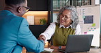 Office meeting, smile and handshake with woman in interview, financial analyst recruitment and laugh. Shaking hands, mature person or hiring agreement with data specialist for investment conversation