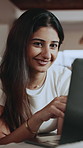 Thinking, woman and smile with laptop for inspiration, typing and remote work in living room. Freelancer, tech and research in home with creative, copywriting and proofreading for blog editor