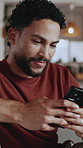 Typing, smile and man in home with phone, online conversation or checking notification on dating app. Thinking, idea or male person in house with tech, romance match or chatting in partner search