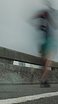 Speed, motion blur and people running in city with exercise, race or runner club training outdoor. Action, endurance and challenge with group performance, cardio and movement for sports in street