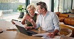 Senior, couple and laptop with documents for budget, retirement planning and bills discussion. People, track online expenses and monitor annuity account for asset management with paperwork at home