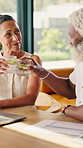Finance, cheers or interracial couple with drink in home for asset management or investment together. Man, woman or smile with laptop, paperwork or toast for financial budget or insurance in house