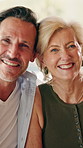 Laugh, face and mature couple home for bonding, commitment and connection in marriage. Happy, portrait and woman with man in living room for embrace, affection and love for loving relationship