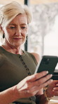 Phone, online shopping and old woman with credit card in home, payment transaction or discount. Mobile, senior person and debit in house for ecommerce purchase, financial app or typing promo code