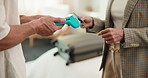 Hotel, card machine and hands with tip for room service,  hospitality and thank you at lodge. Accommodation, pos and guest with payment, purchase and transaction for booking, concierge and gratitude