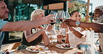 Friends, cheers and lunch on patio with wine, summer holiday and celebration for reunion on weekend. Happy, mature people and toast outdoor in backyard with alcohol drink, food and social gathering.