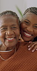Love, senior mother and woman in lounge with face, bonding embrace and quality time in house. Smile, black family and adult daughter with elderly mom, connection and security in happy relationship.