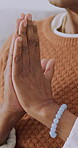 Hands, praying and worship with religion, spiritual growth and connection with God in home. Faith, person and religious healing with gratitude, hope and closeup for praise, belief and devotion