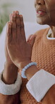 Hands, praying and worship with religion, spiritual growth and connection to God in nursing home. Faith, old woman and religious healing with gratitude, hope and praise for belief and devotion