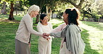 Happy, friends and hands together outdoor with fitness class, motivation and bonding with wellness. Excited, mature women and celebration in park with yoga club, exercise group and support for goals.